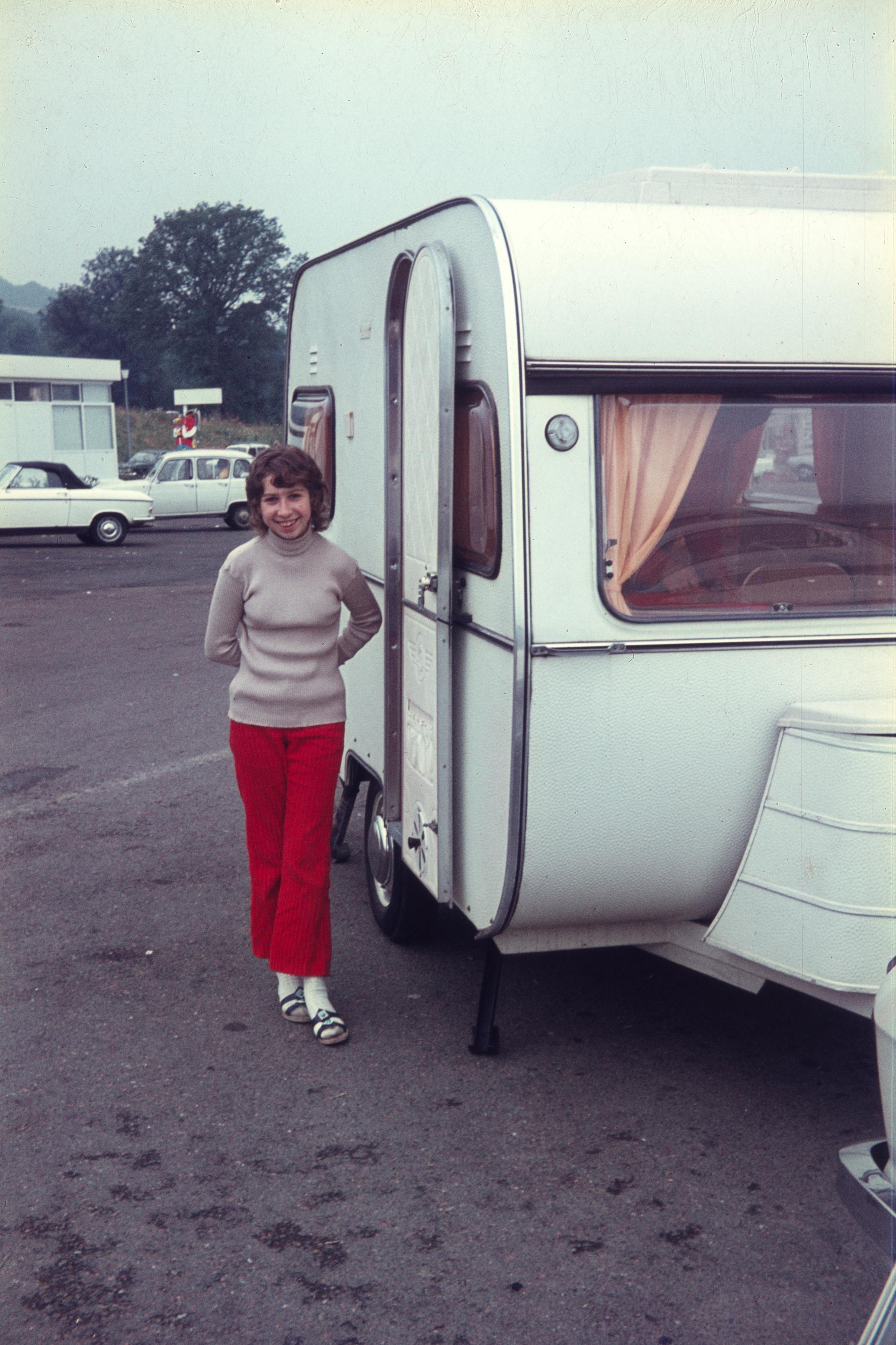 A girl in front of a caravan, a slide from bigkkids'zine